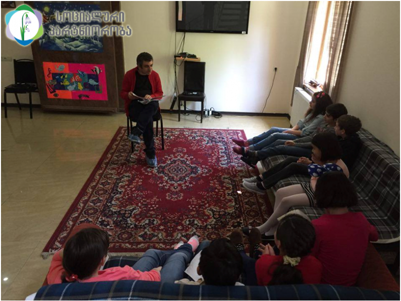 Children’s writer Vaso Guleuri at family type orphanage. image