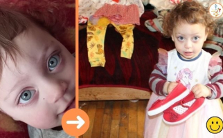 This beautiful little girl shines even in rags...