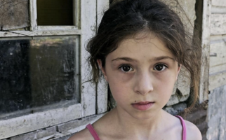 8-year-old Gvantsa dreams of new clothes and a TV.